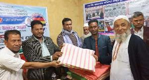 জাতীয় গণমাধ্যম কমিশনের আয়োজনে সাংবাদিকদের  মাঝে  শীত উপহার ও হুউল চেয়ার বিতরণ